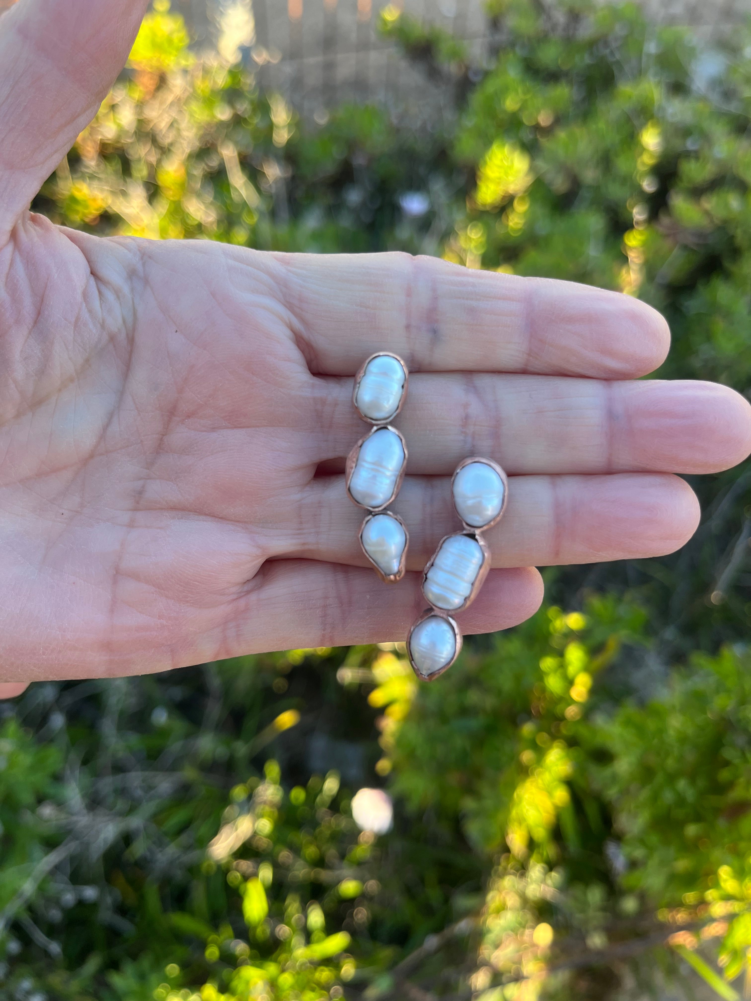 Aros perla en fila